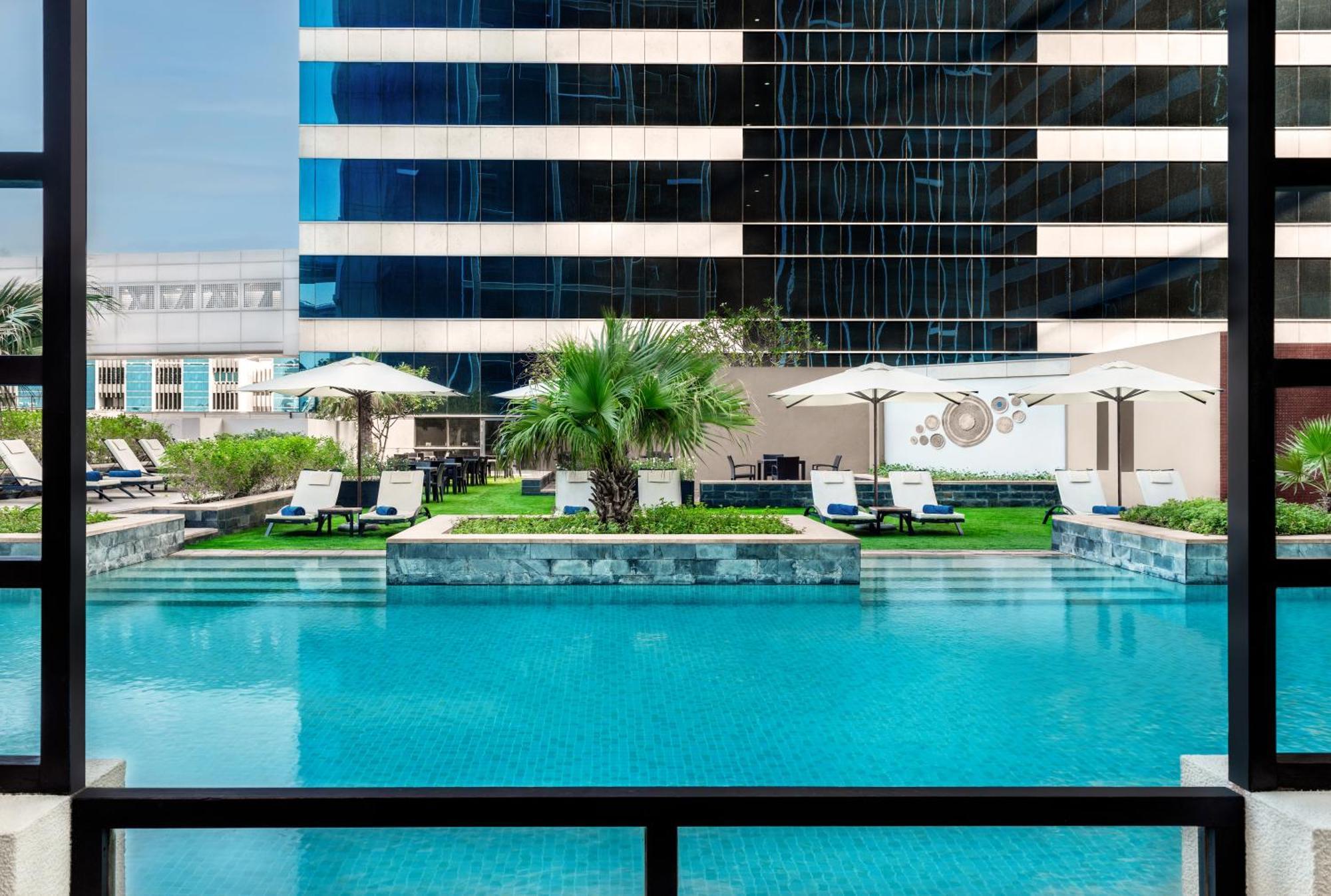 The H Dubai Hotel Exterior photo The pool at the hotel