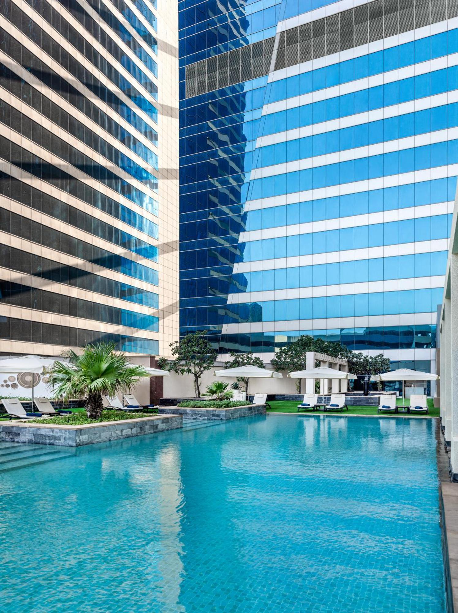 The H Dubai Hotel Exterior photo The swimming pool at the hotel