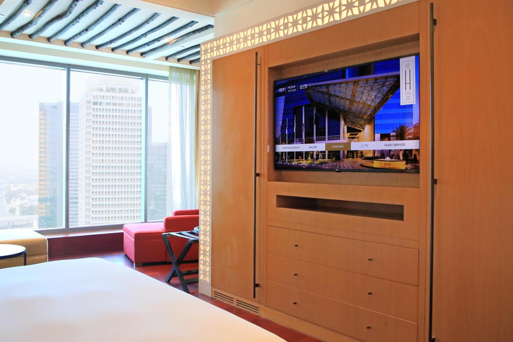 The H Dubai Hotel Room photo A television hidden behind a mirror