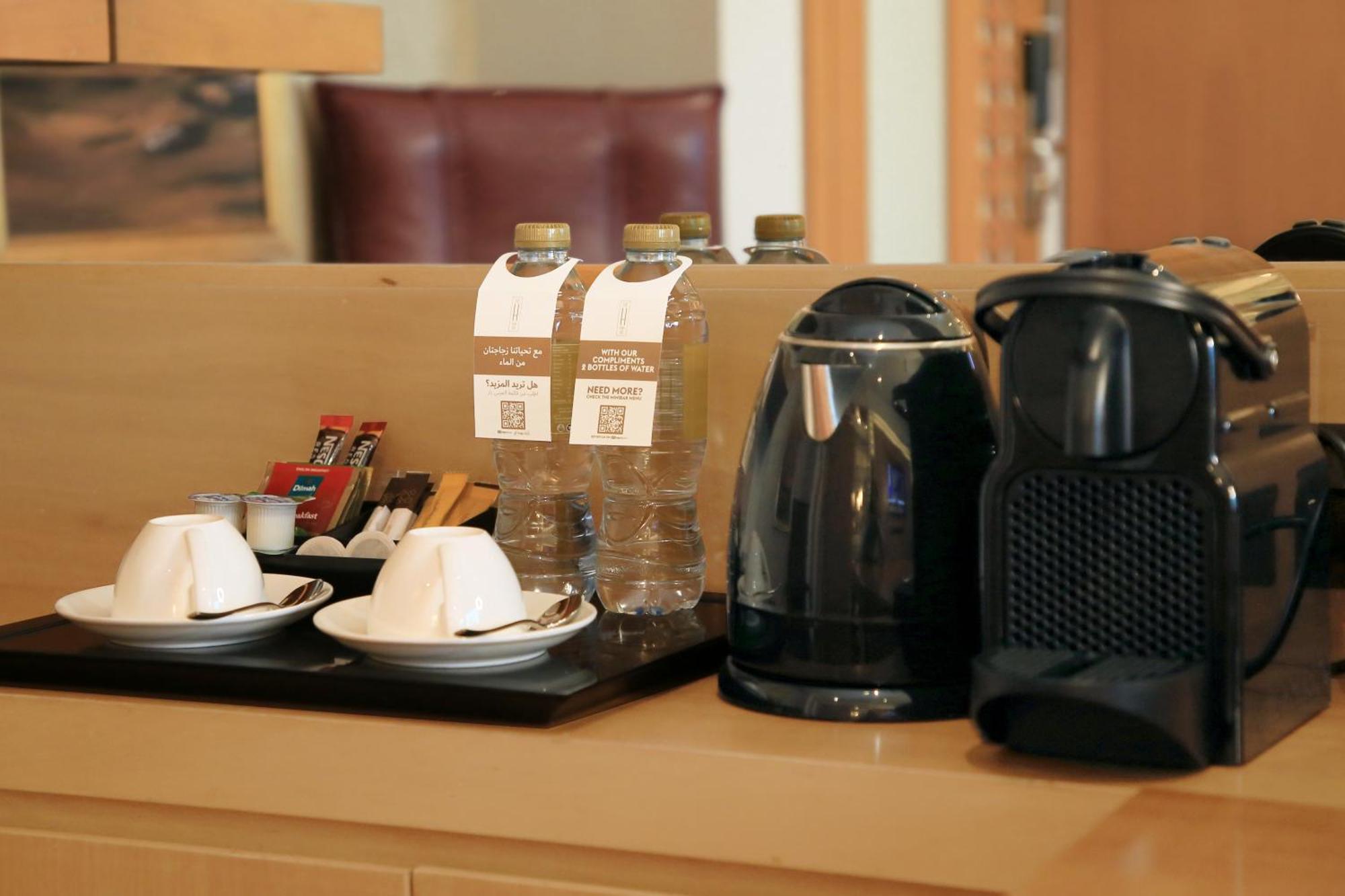 The H Dubai Hotel Room photo A Nespresso coffee machine